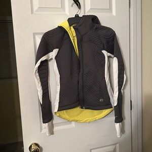 Grey, white and yellow Nike jacket. Size:Extra small